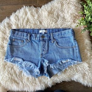Aritzia Talula cut of light wash jean short shots